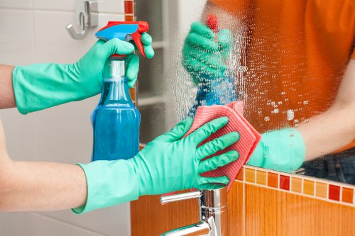 Carpet cleaner preparing equipment safely before a job