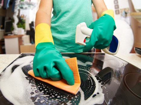 Cleaner treating delicate drapes in a Crossness property